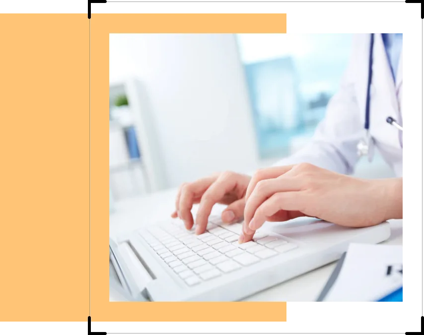 Medical office staff entering claim details on a keyboard